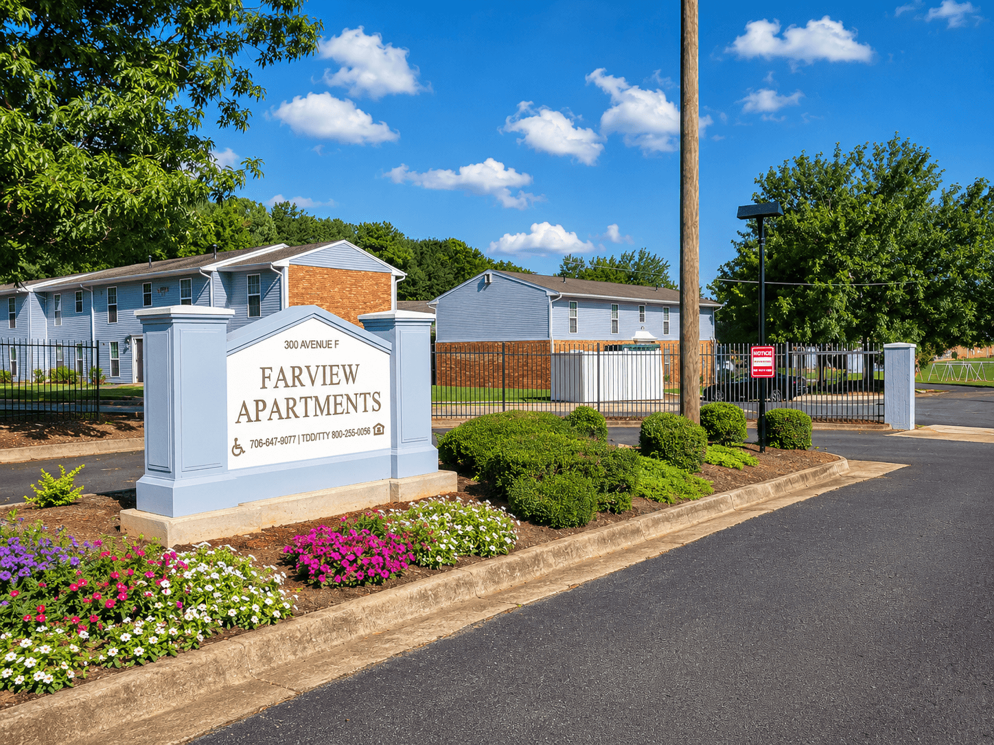 The entrance to Farview Apartments is marked by a large sign.